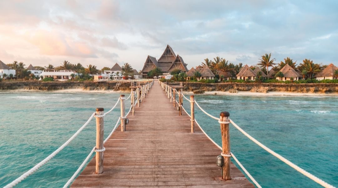 View over Ocean Coast of Zanzibar with Wooden Bridge